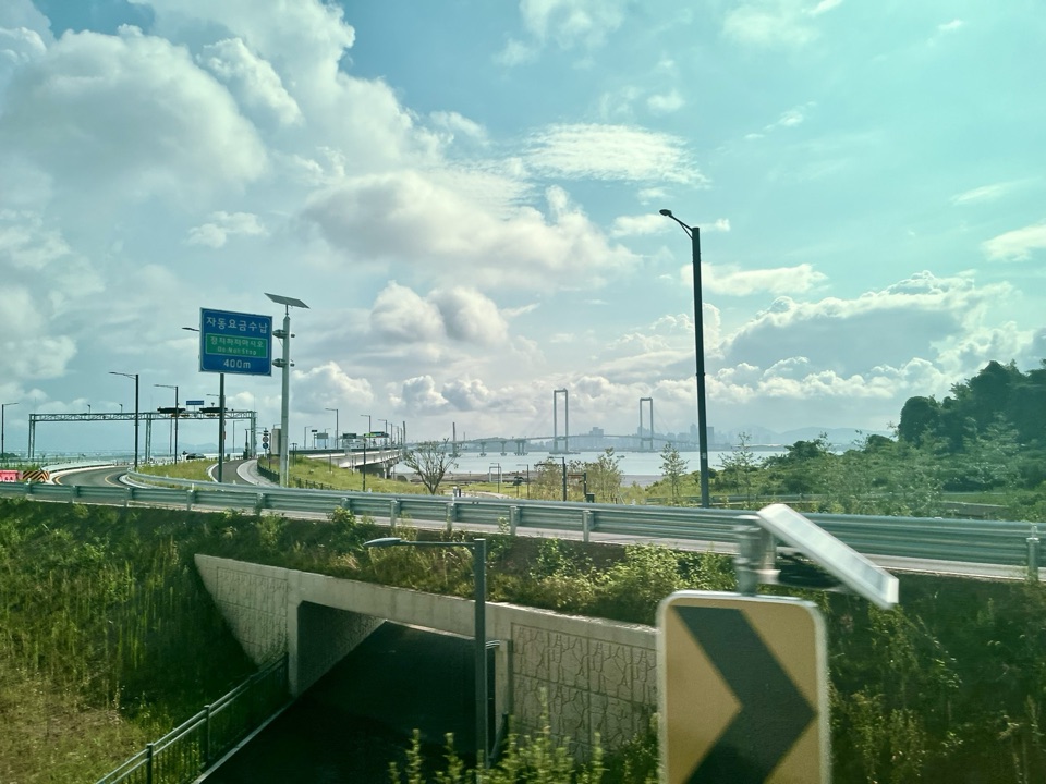 The road into Incheon beneath summer clouds
